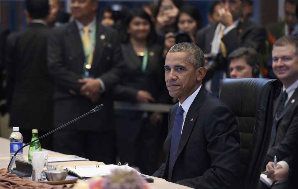 President Barack Obama waits for the media to leave affter he spoke at a US-ASEAN (Association of Southeast Asian Nations) meeting in Kuala Lumpur, Malaysia, Saturday, Nov. 21, 2015. Obama is in Malaysia where he joins leaders from Southeast Asia to discuss trade and economic issues, and terrorism and disputes over the South China Sea. (AP Photo/Susan Walsh)