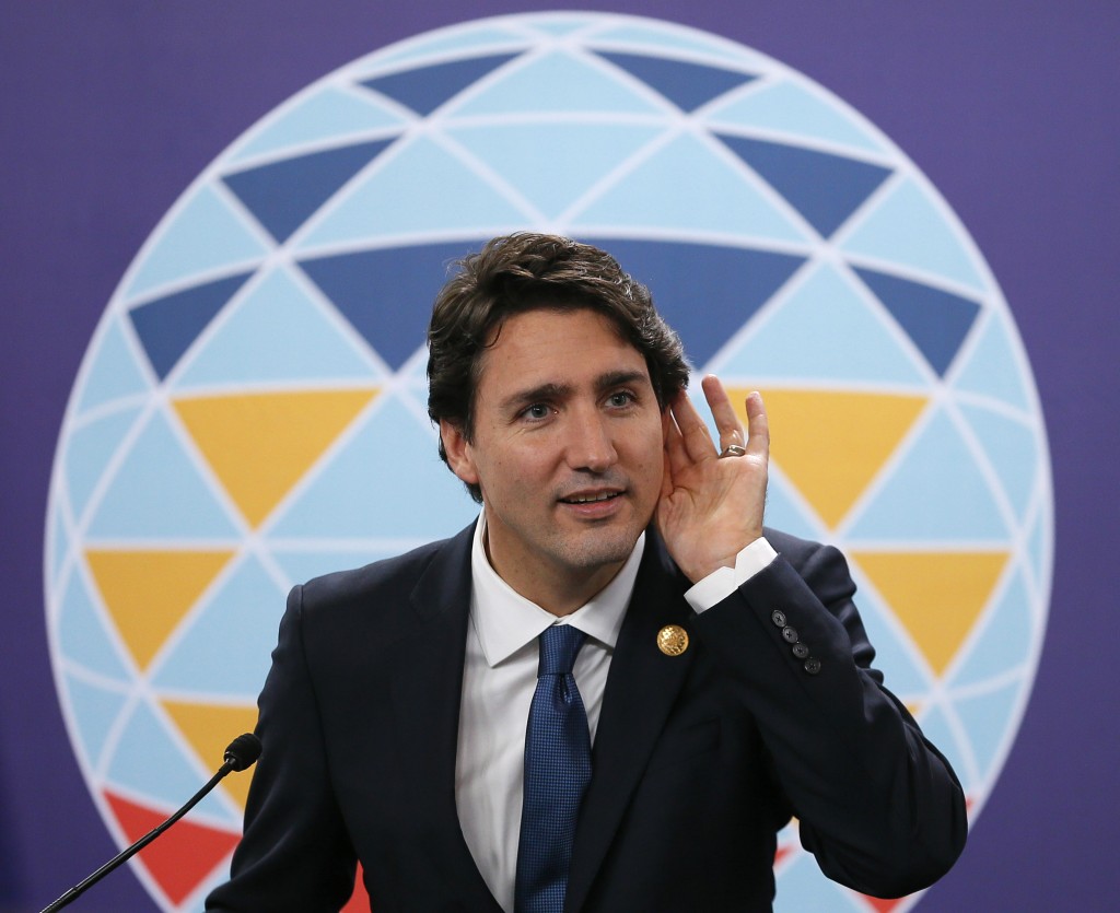 Canadian Prime Minister Justin Trudeau listens to a question during a news conference following the Asia-Pacific Economic Cooperation Summit of Leaders Thursday, Nov. 19, 2015 in Manila, Philippines. Prime Minister Trudeau is embarking on his first foreign trip since becoming a Prime Minister.(AP Photo/Bullit Marquez)