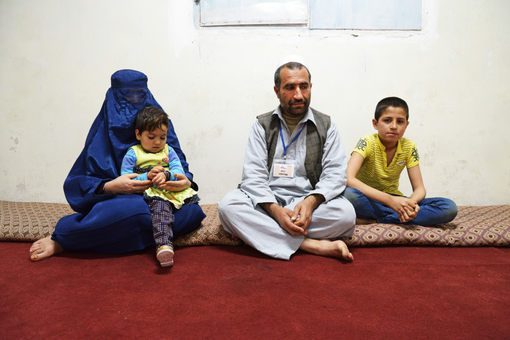 Portrait of 6 year old Shaista with her family. Shaista was injured when a bomb hit her house. She was admitted to the Medecins Sans Frontiers (MSF) hospital in Kunduz and two days later was the only patient in the intensive care unit to survive the attack. PHOTO BY AURELIE BAUMEL/MSF