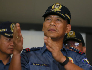 Philippine National Police Director General Ricardo Marquez talks to the media after reading a joint statement from the military and police on the beheading of Canadian hostage John Ridsdel of Calgary, Alberta by Muslim extremist Abu Sayyaf Group in southern Philippines Tuesday, April 26, 2016 at Camp Crame in suburban Quezon city northeast of Manila, Philippines. Ridsdel along with fellow Canadian Robert Hall, Norwegian Kjartan Sekkingstad and Filipino Marites Flor were kidnapped last September from a marina on southern Samal Island with the militants threatening to behead one of the hostages if the large ransom was not paid Monday. (AP Photo/Bullit Marquez)