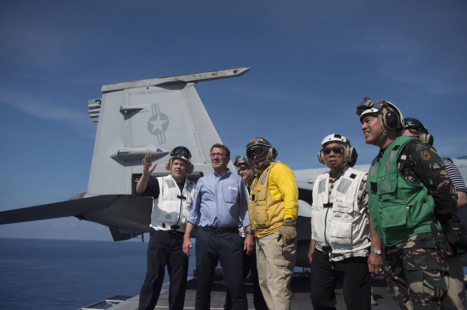 US Secretary of Defense Ashton Carter (second from left), Philippine Defense Sec. Voltaire Gazmin (second from right) and Armed Forces of the Philippines chief Gen. Hernando Iriberri visit the USS John Stennis. PHOTO FROM US DEPARTMENT OF DEFENSE'S FACEBOOK PAGE  