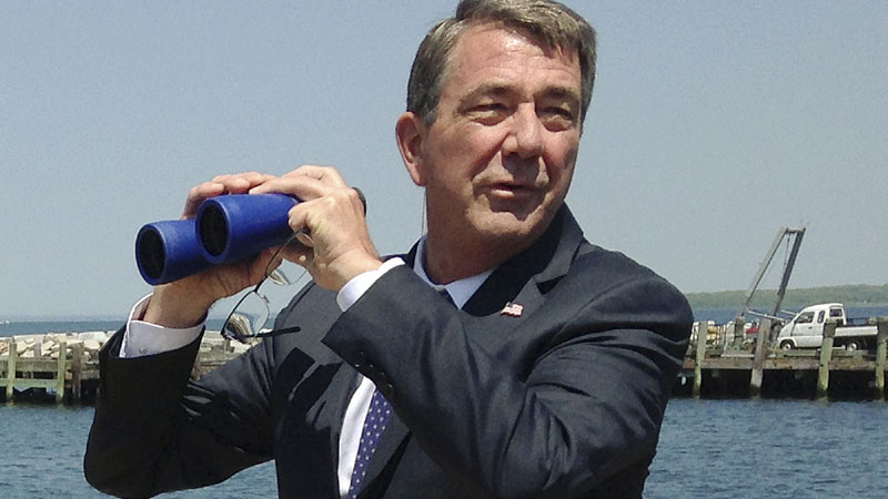 In this Wednesday, May 25, 2016 file photo, U.S. Defense Secretary Ashton Carter comments on the course an unmanned surface vehicle traveled in the bay, which he had plotted on a computer at the Naval Undersea Warfare Center in Newport, R.I. China on Monday, May 30, lashed out at criticism from Carter, accusing him of harboring a Cold War mentality and saying Beijing has no interest in "playing a role in a Hollywood movie" of Washington's design. (AP Photo/Jennifer McDermott, File)