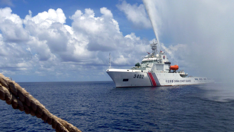 A CHINESE Coast Guard ship approaches Filipino fishermen off Panatag Shoal in the West Philippine Sea in this photo dated Sept. 23, 2015, which was provided by one of the fishermen, Renato Etac. AP