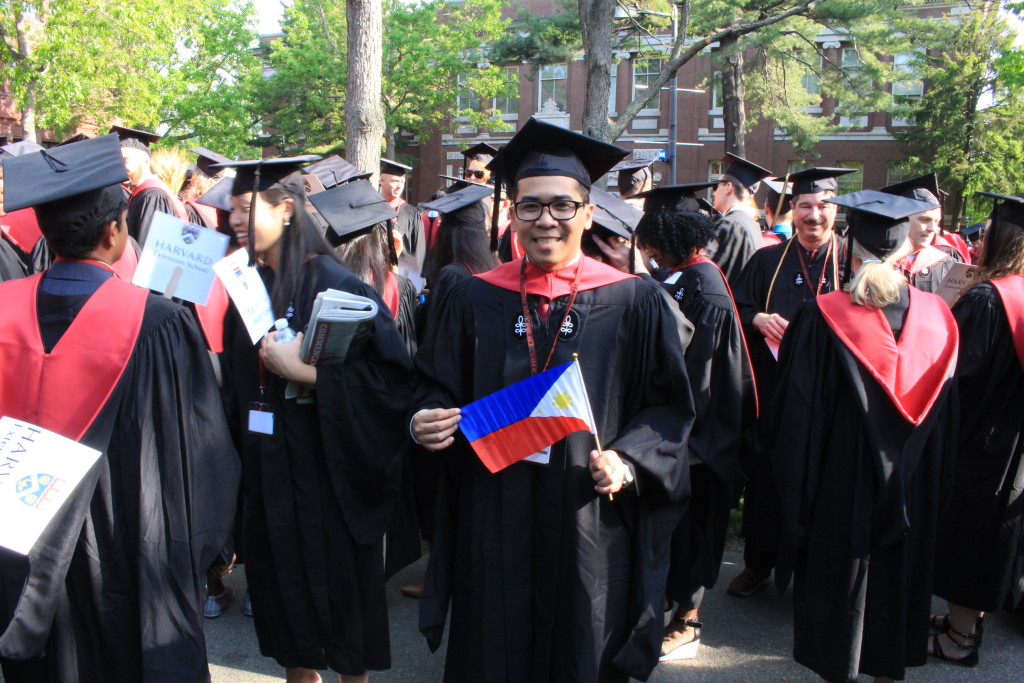Graduates of the Master of Liberal Arts (ALM) program in full academic regalia await the Commencement processional of Harvard University on May 26, 2016. Michael Ubac is the lone Filipino in the program.