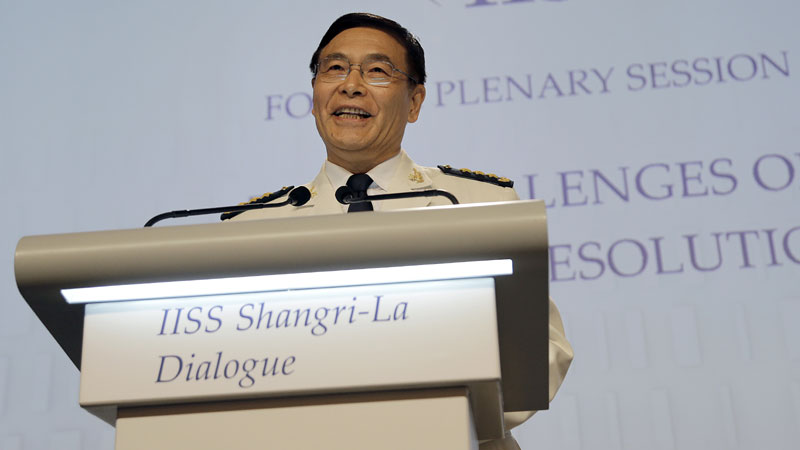 China's Deputy Chief, Joint Staff Department, Central Military Commission, Adm. Sun Jianguo delivers his speech about "The Challenges Of Conflict Resolution" at the 15th International Institute for Strategic Studies Shangri-la Dialogue, or IISS, Asia Security Summit on Sunday, June 5, 2016, in Singapore. (AP Photo/Wong Maye-E)