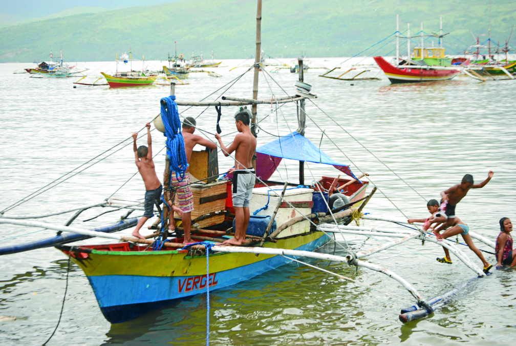 The coastal town of Subic in Zambales province hosts about 2,000 fishermen, many of whom have been frequenting the disputed Scarborough Shoal to earn a living. These fishermen are eagerly awaiting an international tribunal  to hand down its ruling on the territorial dispute between the Philippines and China over the South China Sea.Photo by Allan Macatuno 