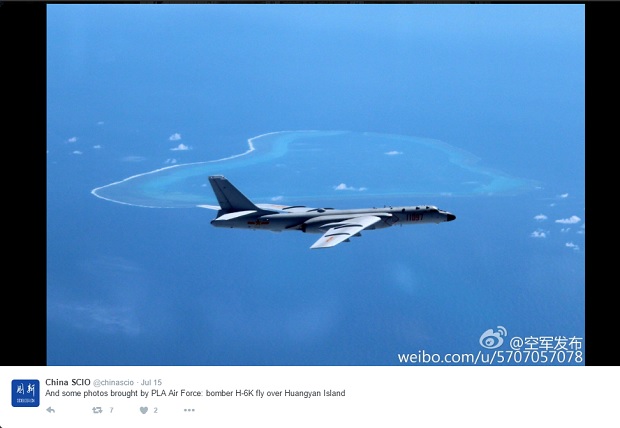 A Chinese H-6K long range bomber flies over Panatag (Scarborough) Shoal in the Philippine Exclusive Economic Zone after the UN Permanent Court of Arbitration trashed China's 9-Dash Line claim. SCREENGRAB FROM CHINA'S STATE COUNCIL INFORMATION OFFICE TWITTER PAGE / WEIBO.COM