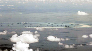 COURT RULING COUNTDOWN  This photo, taken on May 11, 2015, shows land reclamation on Panganiban Reef in the Spratly Islands in the South China Sea.  A landmark ruling on Tuesday on the arbitration case brought by the Philippines that seeks to strike down China’s claim to almost all of the South China Sea will be a test for international law and world powers. AP FILE PHOTO