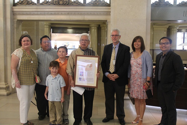 Mr. Roberto Mercado (5th from left) hands over the commemorative Mama Sita stamps to Mr. Ted Wilson (6th from left) of the Collections Department of the National Postal Museum on 15 August 2016.
