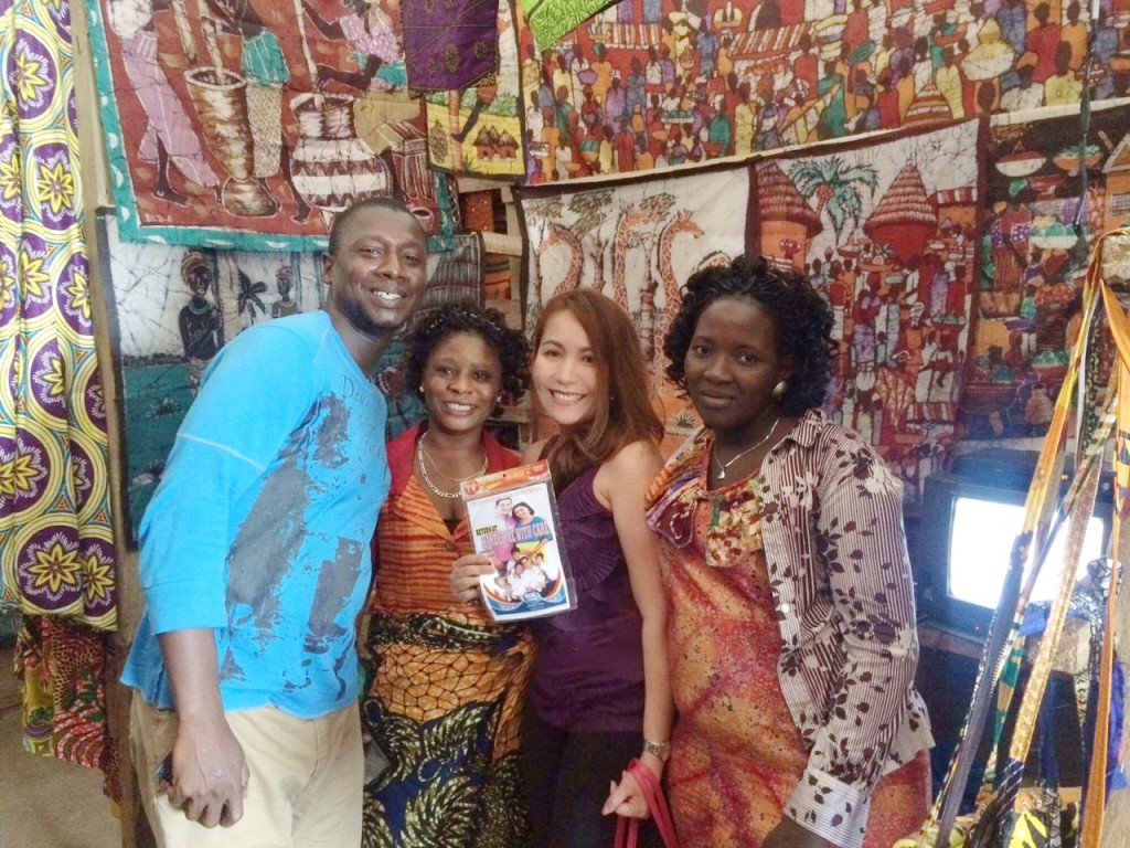 The author (3rd from left) was more than surprised to find DVD copies of soap operas from the Philippines, in all places, at Freetown’s Big Market. CONTRIBUTED PHOTO/Daisy Diamante