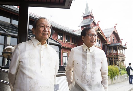 At the start of Philippine peace negotiations hosted by Norway government, Monday Aug. 22, 2016, in Oslo, Norway, with Jose Maria Sison of NDFP, left, and Philippine peace minister Jesus Dureza, as Philippine government officials and rebels participate in the peace negotiations. Norwegian officials opened a new round of peace talks between the government of Philippine President Rodrigo Duterte and communist rebel members of National Democratic Front of the Philippines (NDFP) aimed at ending one of Asia's longest-running rebellions that has killed an estimated 150,000 people. (Berit Roald / NTB scanpix via AP)