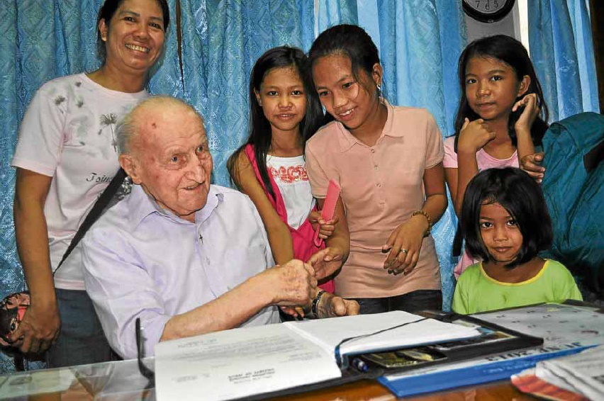 FATHER TRITZ and the underprivileged: A living reminder of the Christian and Jesuit vocation to take care of those left behind by society. CONTRIBUTED PHOTO
