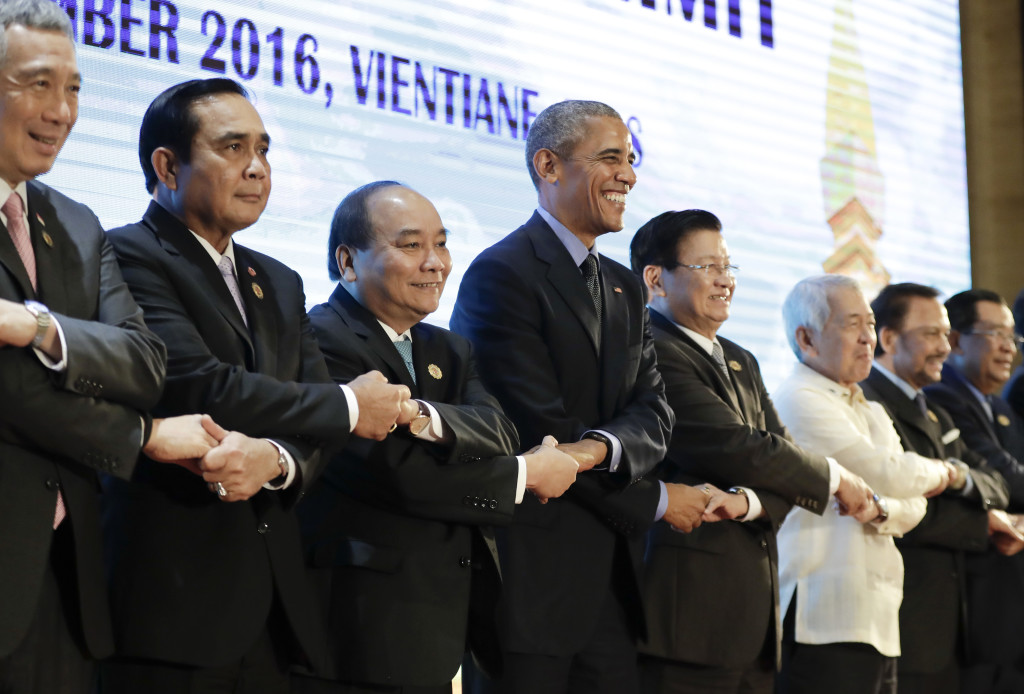 U.S. President Barack Obama, fourth left, poses for a photo before the start of the ASEAN-U.S. Summit Meeting at National Convention Center in Vientiane, Laos, Thursday, Sept. 8, 2016. From left: Singapore's Prime Minister Lee Hsien Loong, Thailand's Prime Minister Prayuth Chan-ocha, Vietnam's Prime Minister Nguyen Xuan Phuc, Obama, Laos' Prime Minister Thongloun Sisoulith, Philippines Foreign Affairs Secretary Perfecto Yasay, Brunei's Sultan Hassanal Bolkiah and Cambodia's Prime Minister Hun Sen. (AP Photo/Carolyn Kaster)