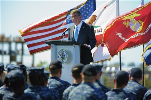 Secretary of Defense Ash Carter speaks to sailors on the flight deck of the USS Carl Vinson, Thursday, Sept. 29, 2016 at Naval Air Station, North Island in Coronado, Calif. Defense Secretary Ash Carter on Thursday said the U.S. will "sharpen our military edge" in Asia and the Pacific in order to remain a dominant power in a region feeling the effects of China's rising military might. Carter made the pledge in a speech aboard the aircraft carrier USS Carl Vinson in port in San Diego. (Nelvin C. Cepeda/The San Diego Union-Tribune via AP)