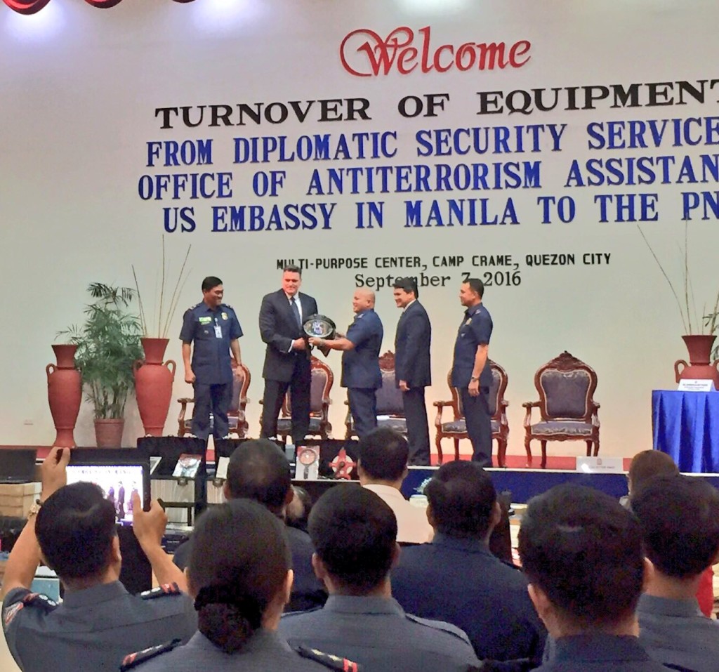 PNP chief Dir. Gen. Ronald "Bato" dela Rosa formally accepts P40-million worth of security equipment the US government donated to the PNP. Photo by Julliane Love de Jesus/INQUIRER.net