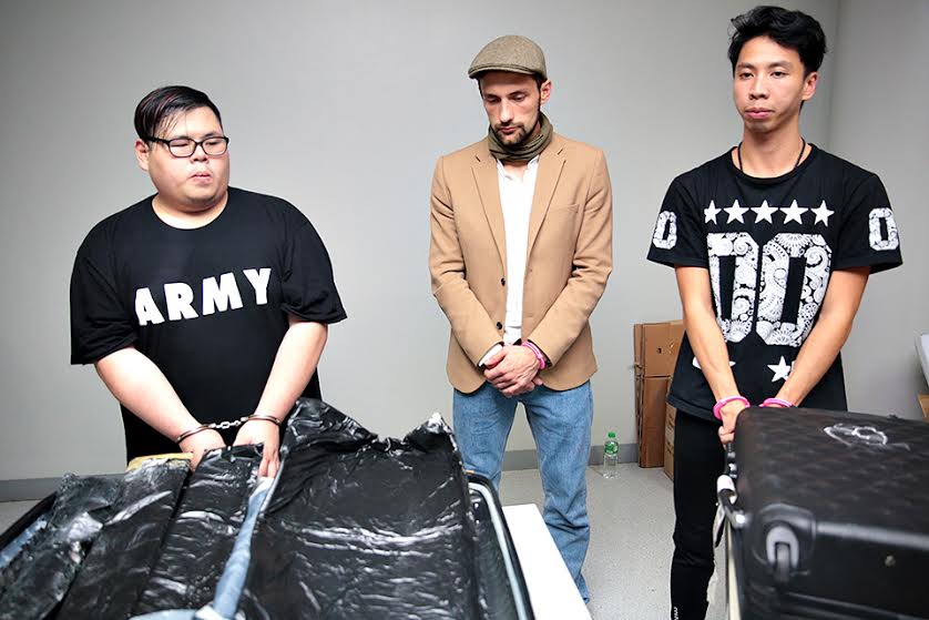 Russian Kirdyushkin Yuri (center) and Hong Kong nationals Chan Kawai and Pau Homanevan, were arrested at the Ninoy Aquino International Airport, on Oct. 5, 2016, after P135 million worth of cocaine and shabu were found inside their luggge. (PHOTO BY THE MIAA MEDIA AFFAIRS DIVISION)