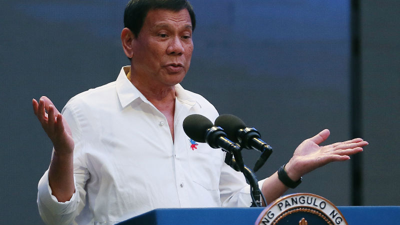 Philippine President Rodrigo Duterte gestures during his address to a Filipino business sector in suburban Pasay city south of Manila, Philippines Thursday, Oct. 13, 2016. Duterte has been under criticism by international human rights groups, the United Nations, European Union and the United States for the more than 3,000 deaths of mostly suspected drug-users and drug-pushers in his so-called "War on Drugs" campaign since assuming the presidency on June 30. (AP Photo/Bullit Marquez)