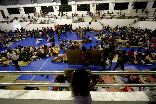 More than 700 residents living on the shoreline take refuge on Alcala Gymnasium after pre emptive evacuation due to Supertyphoon Lawin in Alcala town, Cagayan. INQUIRER PHOTO / RICHARD A. REYES