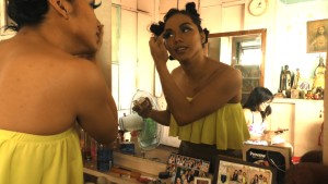 Jazz Pasion prepares for pride parade in Manila with filmmaker Joella Cabalu in the background