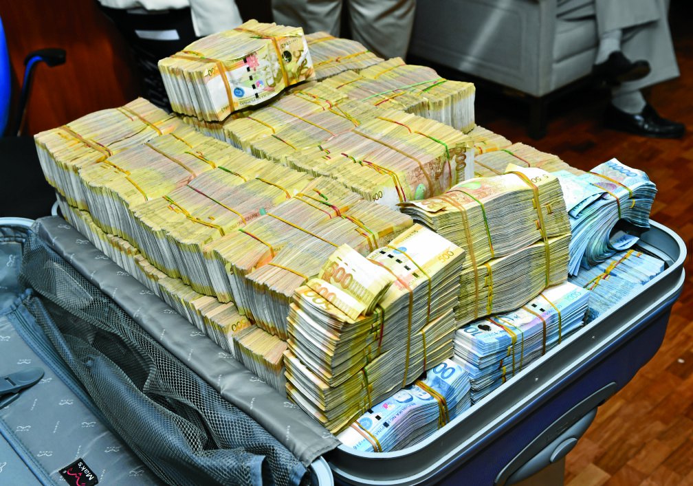 Money turned over by casino junket operator Kim Wong to the Anti-Money Laundering Council after the $81-million money laundering scandal at the Rizal Commercial Banking Corp. erupted. INQUIRER FILE PHOTO 