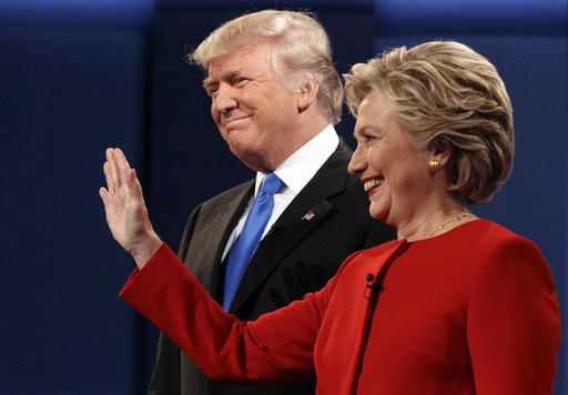 Republican presidential candidate Donald Trump, left, stands with Democratic presidential candidate Hillary Clinton at the first presidential debate at Hofstra University, Monday, Sept. 26, 2016, in Hempstead, N.Y. AP Photo