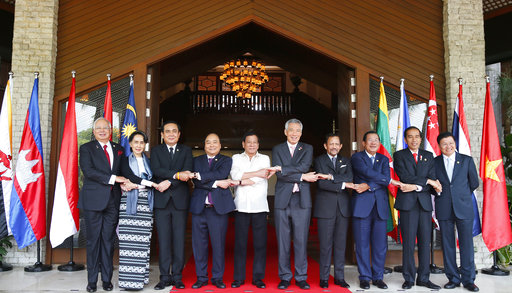 Southeast Asian leaders pose for a group photo following their retreat in the 30th ASEAN Leaders' Summit Saturday, April 29, 2017 in Manila, Philippines. From left; Malaysian Prime Minister Najib Razak, Myanmar Foreign Minister Aung San Suu Kyi, Thai Prime Minister Prayuth Chan-ocha, Vietnamese Prime Minister Nguyen Xuan Phuc, Philippine President Rodrigo Duterte, Singapore Prime Minister Lee Hsien Loong, Sultan Hassanal Bolkiah of Brunei Darussalam, Cambodian Prime Minister Hun Sen, Indonesian President Joko Widodo and Lao Prime Minister Thongloun Sisoulith. AP PHOTO