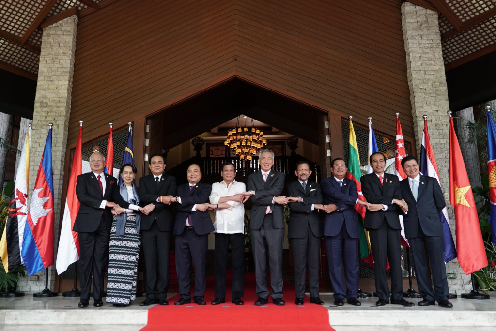 Leaders of the Association of Southeast Asian Nations (ASEAN) link arms in the iconic ASEAN way during the 30th ASEAN Summit Retreat at the Coconut Palace, Manila on April 29. (L-R) Malaysian Prime Minister Dato Sri Mohd Najib Bin Tun Abdul Razak; State Counsellor for Myanmar  Aung San Suu Kyi; Thai Prime Minister General Prayut Chan-o-cha; Vietnam Prime Minister Nguyen Xuan Phuc;  Philippine President Rodrigo Roa Duterte; Singaporean Prime Minister Lee Hsien Loong; Brunei Sultan Haji Hassanal Bolkiah; Cambodian Prime Minister Hun Sen; Indonesian President Joko Widodo; and Lao Prime Minister Thongloun Sisoulith. Photo from DFA