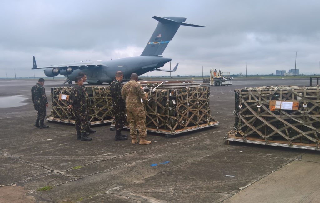 Members of both the US and Philippine armies unload and inspect a delivery of 992 2.75 inch rockets from the U.S. to the Armed Forces of the Philippines (AFP) at Clark Air Base, Pampanga. Photo courtesy of the US Embassy in Manila.