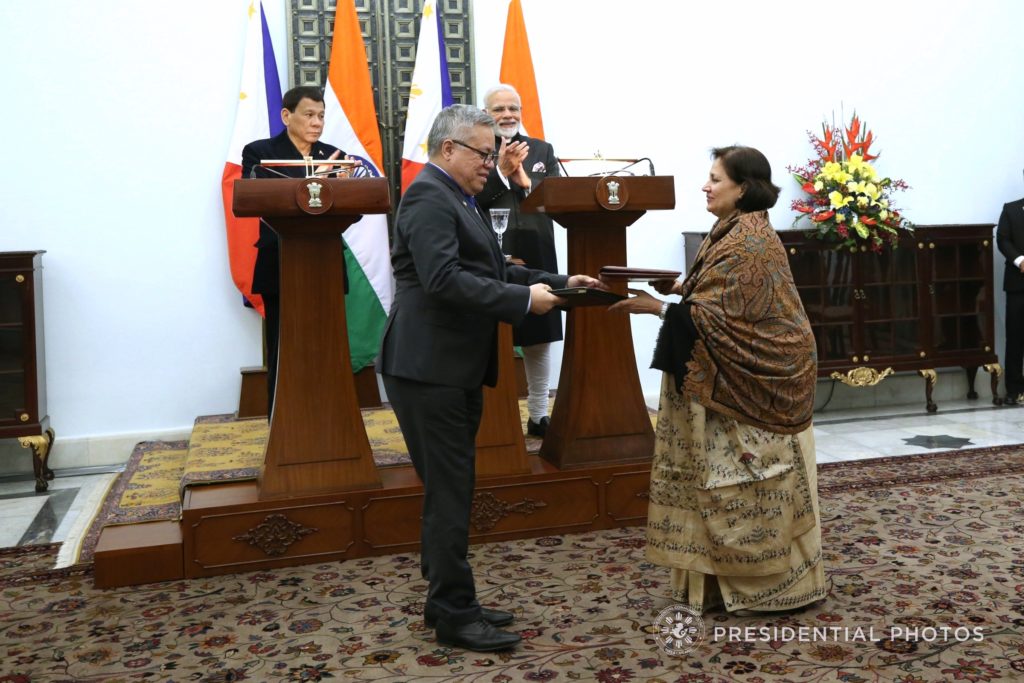 President Rodrigo Roa Duterte and India Prime Minister Narendra Modi witness the ceremonial exchange of signed Memorandum of Understanding (MOU) between Trade and Industry Secretary Ramon Lopez and India Ministry of External Affairs Secretary (East) Preeti Saran following the successful bilateral meeting at the Hyderabad House in New Delhi, India on January 24, 2018. The MOU is on the Philipines' Board of Investment and Invest India. KARL NORMAN ALONZO/PRESIDENTIAL PHOTO