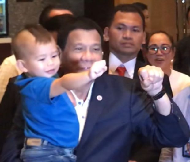 Rodrigo Duterte Singapore Boy Fist Bump Two-year old, Charlie, does the fist bump with President Rodrigo Duterte when the two met in a hotel in Singapore, where the Chief Executive is attending the Asean Summit on Nov. 14, 2018. INQUIRER.NET / MAILA AGER