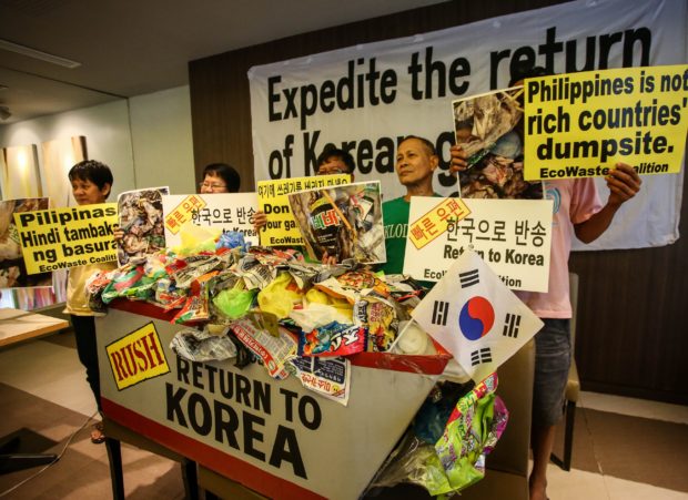 PH NO DUMP At a press conference in Quezon City on Wednesday, members of EcoWaste Coalition call for the swift return to South Korea of some 6,500 tons of garbage illegally transported to the Philippines in July last year. A customs official announced that the first of two shipments—which slipped through Tagoloan port in Misamis Oriental province—must be returned to their country of origin by Jan. 9. INQUIRER PHOTO/ JAM STA ROSA