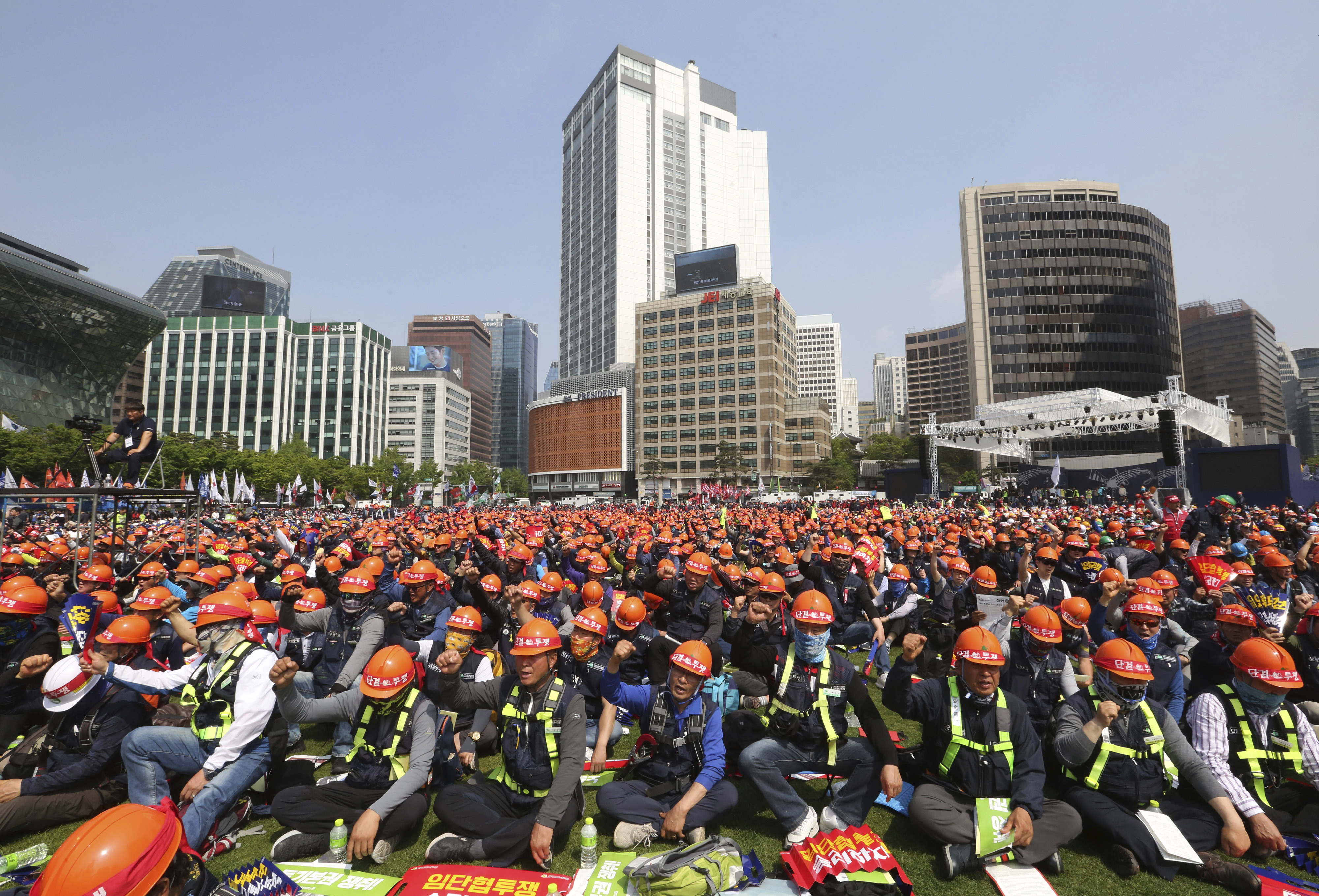 In Asia, thousands march on May Day, demand better working conditions