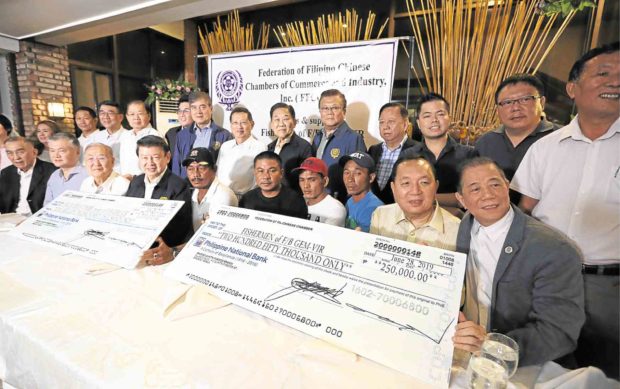Tsinoy biz group gives P1.4M to crew, owner of ill-fated boat