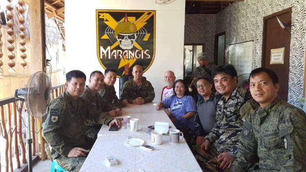Photo of HYRONS couple with soldiers. Photo courtesy of Philippine Army's 11th Infantry Division