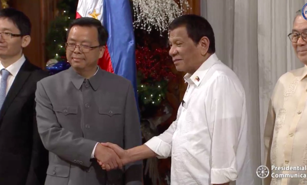 President Rodrigo Duterte welcomes China’s newly-appointed ambassador to the Philippines, Huang Xilian, in Malacanñang on Wednesday, Dec. 4. 2019. (Screenshot from RTVM Facebook)