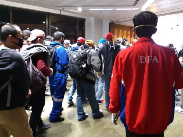 Some 123 Filipino seafarers from Spain arrive in the Philippines Thursday night. Photo courtesy of DFA Office of the Undersecretary for Migrant Workers’ Affairs (OUMWA)