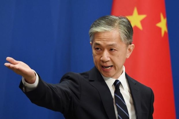 Chinese Foreign Ministry Spokesman Wang Wenbin takes a question during the daily Foreign Ministry briefing in Beijing on July 24, 2020. (FIle photo from GREG BAKER / AFP via China Daily/Asia News Network)