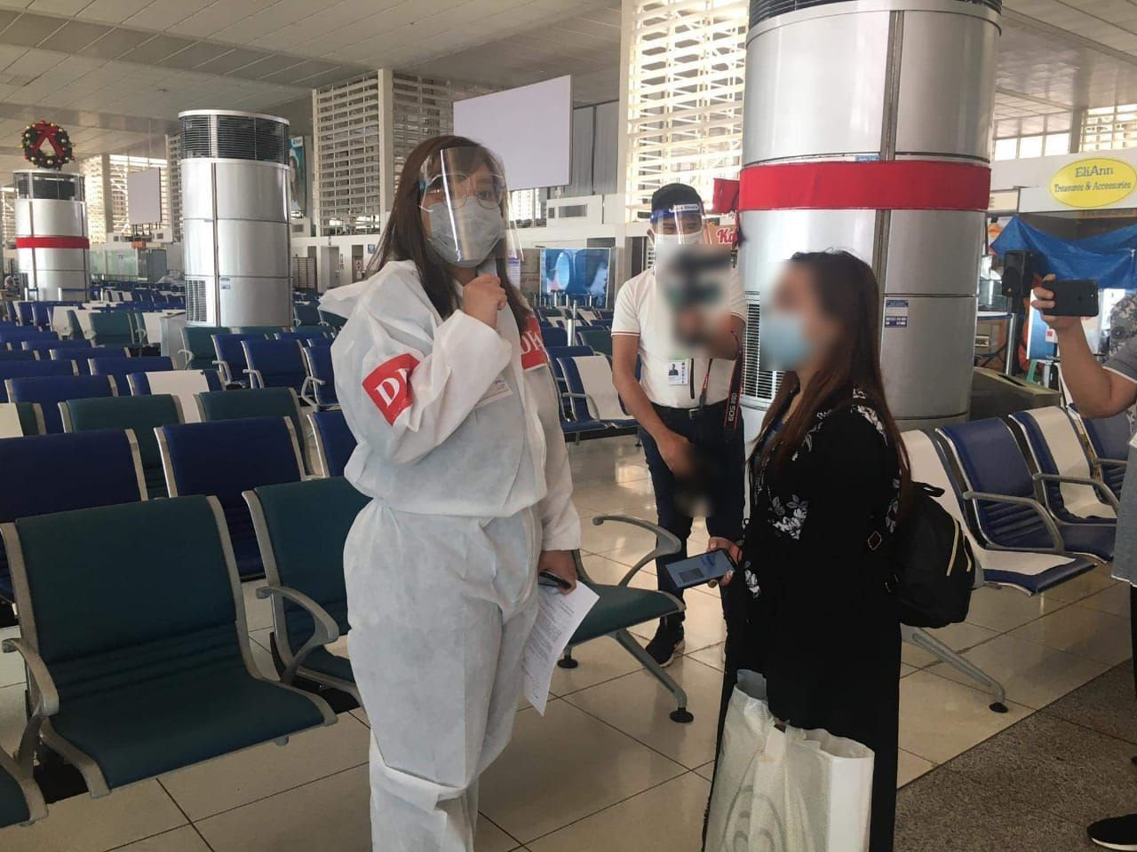 Overseas Filipino worker Rose Policarpio (left) arrives in Manila on Tuesday, Sept. 22, 2020. Photo courtesy of the Department of Foreign Affairs.