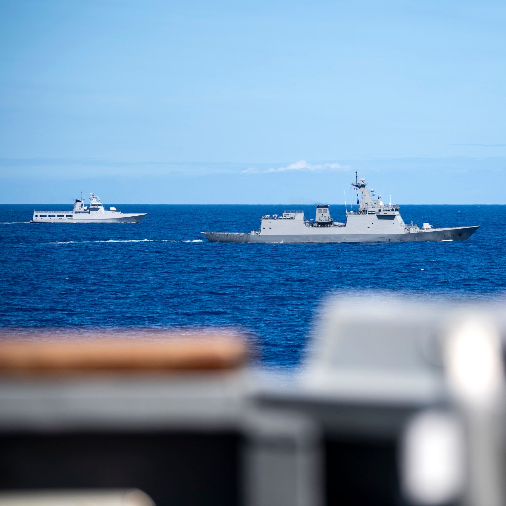 Philippine Navy frigate BRP Jose Rizal (FF 150) and Royal Brunei Navy offshore patrol vessel KDB Darulehsan (OPV 07) sail alongside USS Chung-Hoon (DDG 93) as part of a group sail following exercise Rim of the Pacific 2020. (U.S. Navy photo by Mass Communication Specialist 1st Class Devin M. Langer)