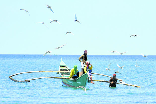 Local fisherfolk trawling near Scarborough shoal were harassed and ordered to go out of the sea by alleged Chinese maritime militia boats last February 3 and February 6, a non-government organization claimed on Friday.
