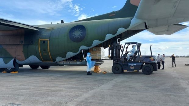 Unloading operations after the C-130's arrival in Cebu. Image from TECO