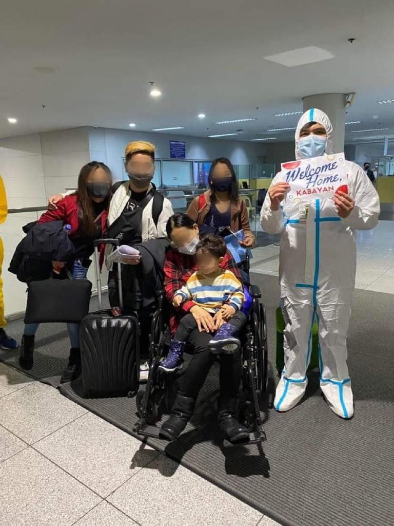 Filipino repatriates from Ukraine arrive at the Ninoy Aquino International Airport on Friday, Feb. 18, 2022. 