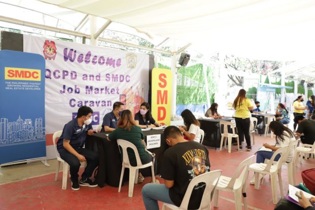 police in tables interviewing applicants with smdc background