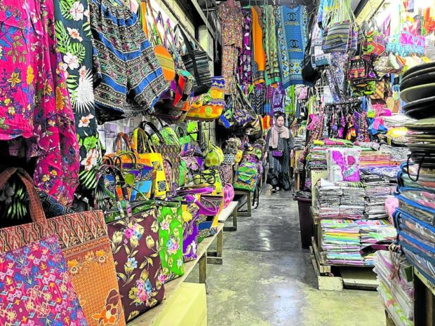 colorful handicrafts and textiles on display at Canelar Barter Trading Center in Zamboanga City. STORY: Traders, workers feel ‘heat’ from legal row over Sabah