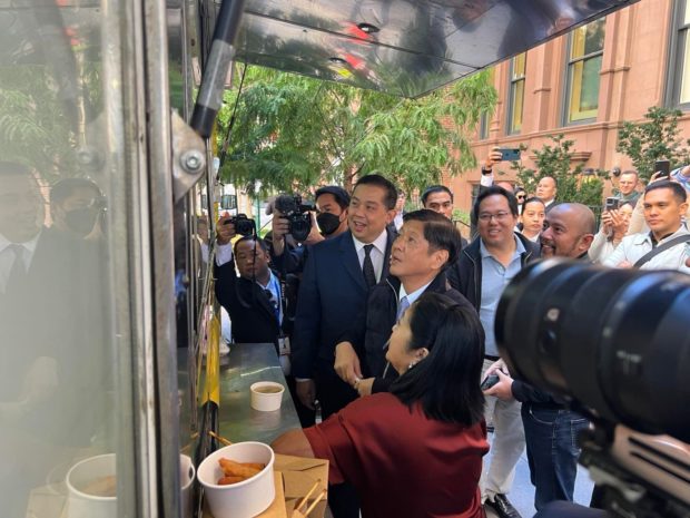 President Bongbong Marcos, First Lady Liza Marcos and some members of their delegation sampled Filipino fare being sold at a food truck outside their hotel in New York. Photos from Office of the Speaker Martin Romualdez