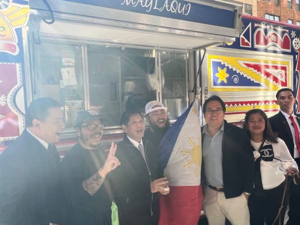 President Bongbong Marcos, First Lady Liza Marcos and some members of their delegation sampled Filipino fare being sold at a food truck outside their hotel in New York. Photos from Office of the Speaker Martin Romualdez