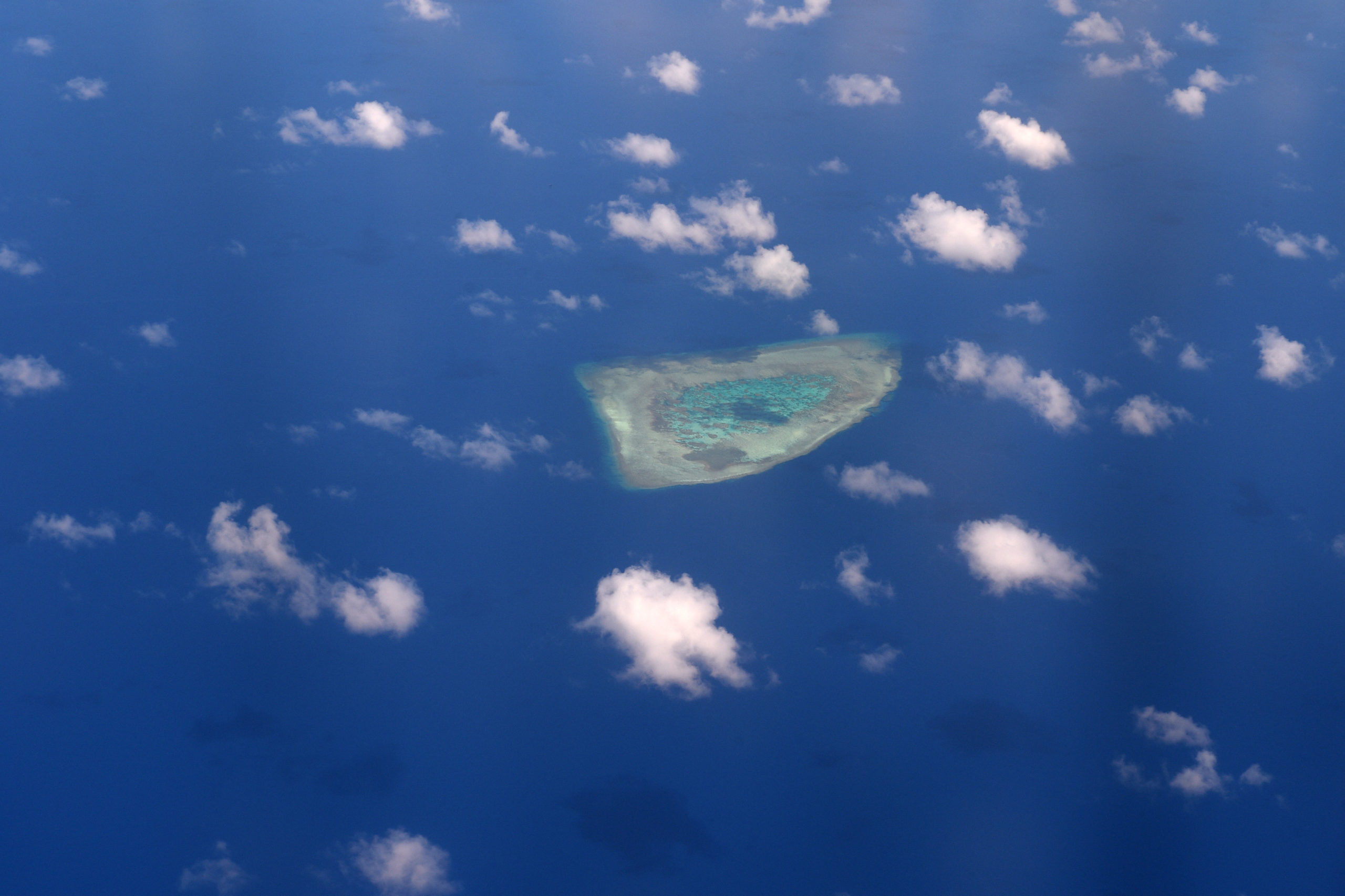 The DFA is “seriously concerned” about China's reported reclamation activities in Spratly Islands' unoccupied reefs in the South China Sea.