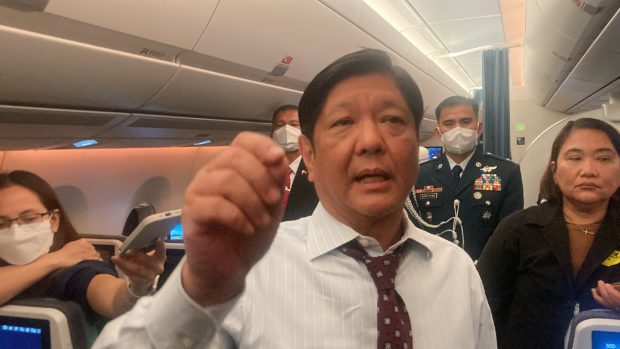 President Ferdinand "Bongbong" Marcos Jr. speaks to reporters onboard PR001 enroute to Belgium to attend the Association of Southeast Asian Nations-European Union (Asean-EU) Commemorative Summit in Brussels. (Photo by Nestor Corrales)