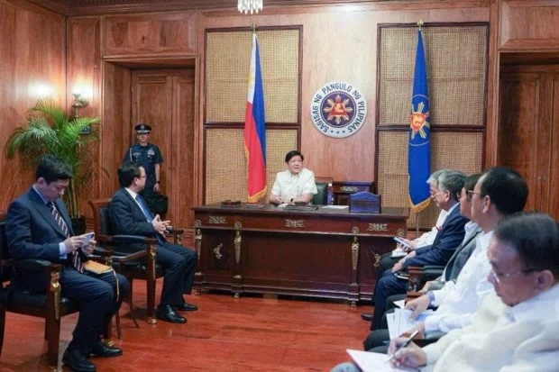 Ferdinand Marcos Jr. with Huang Xilian STORY: Marcos summons China envoy over ‘actions against PCG, our fishermen’