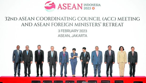 Indonesian Foreign Minister Retno Marsudi (center) and her counterparts from other members of the Association of Southeast Asian Nations (Asean), prepare to pose for group photos during the 32nd Asean Coordinating Council meeting in Jakarta, Indonesia, on Feb. 3. STORY: Indonesia to intensify talks on South China Sea code of conduct